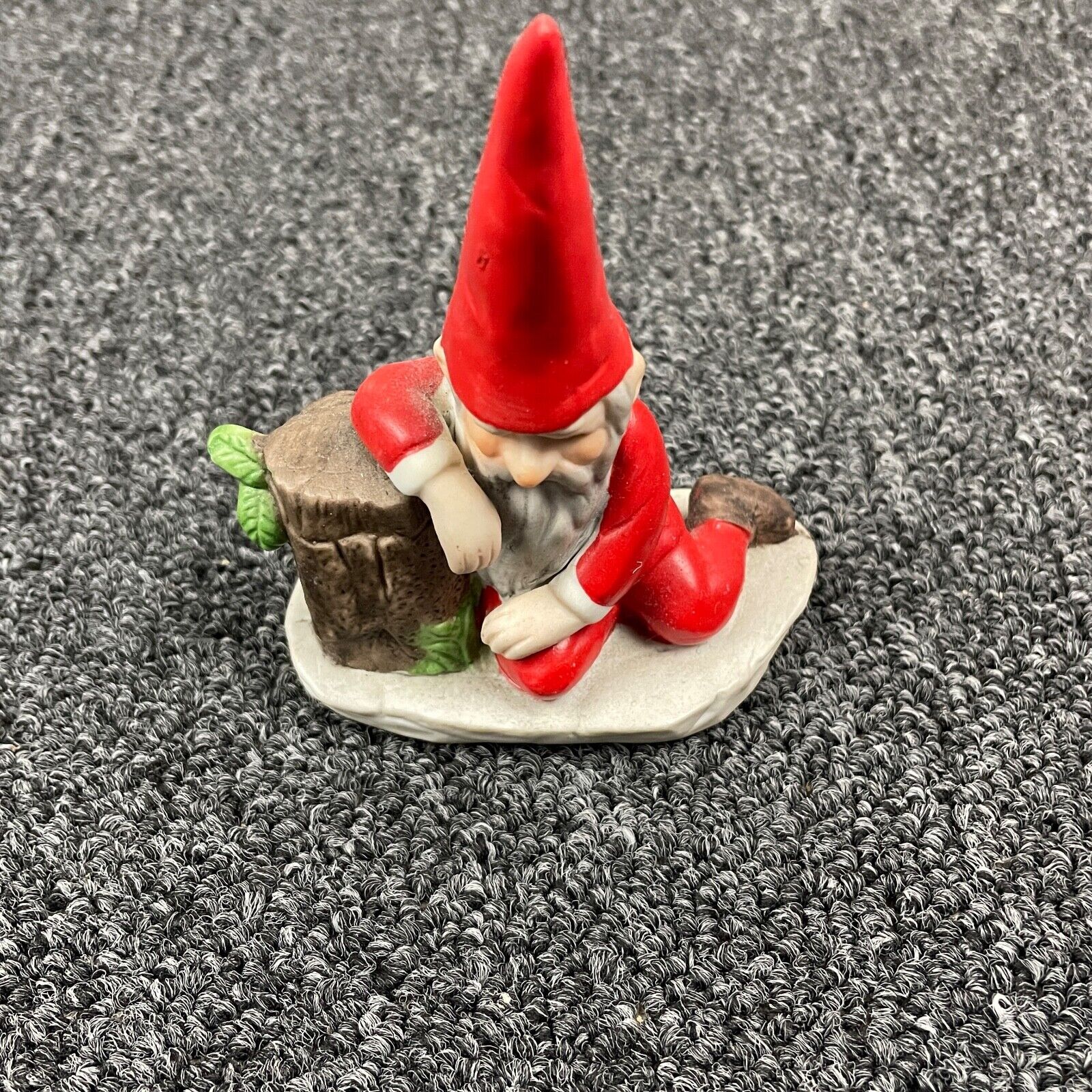 Christmas Gnome Red Leaning On Stump Bearded