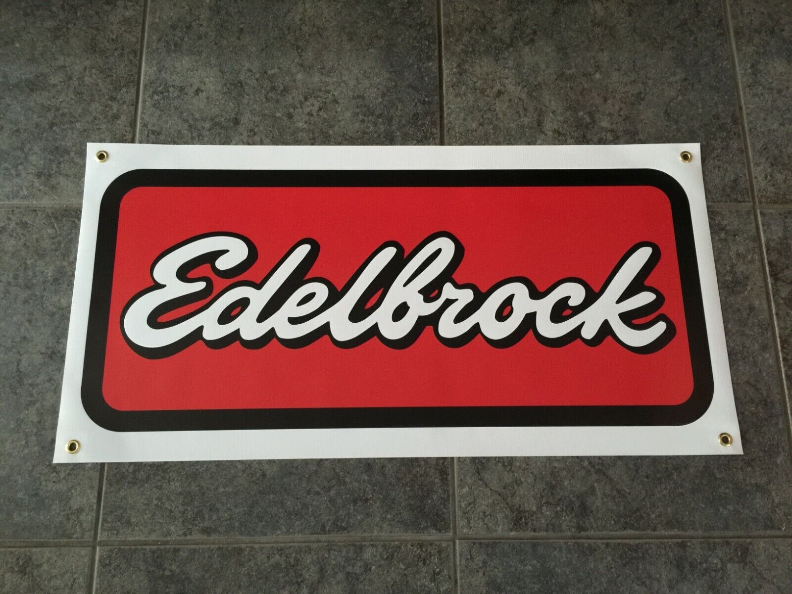 Edelbrock banner sign shop wall garage carburetor intake manifold air intake