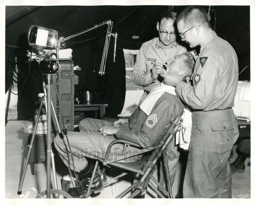 Military portable dentist office soldier in dental chair vintage medical photo