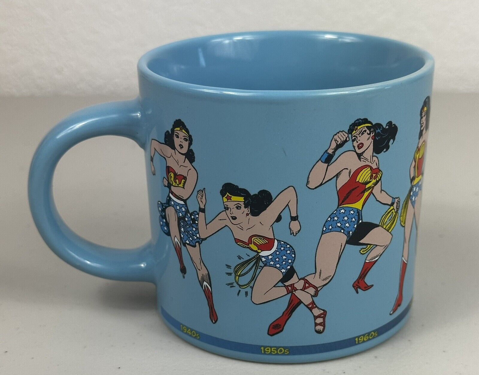 Wonder Woman Through the Years Coffee Mug 2015 Unemployed  Philosopher's Guild