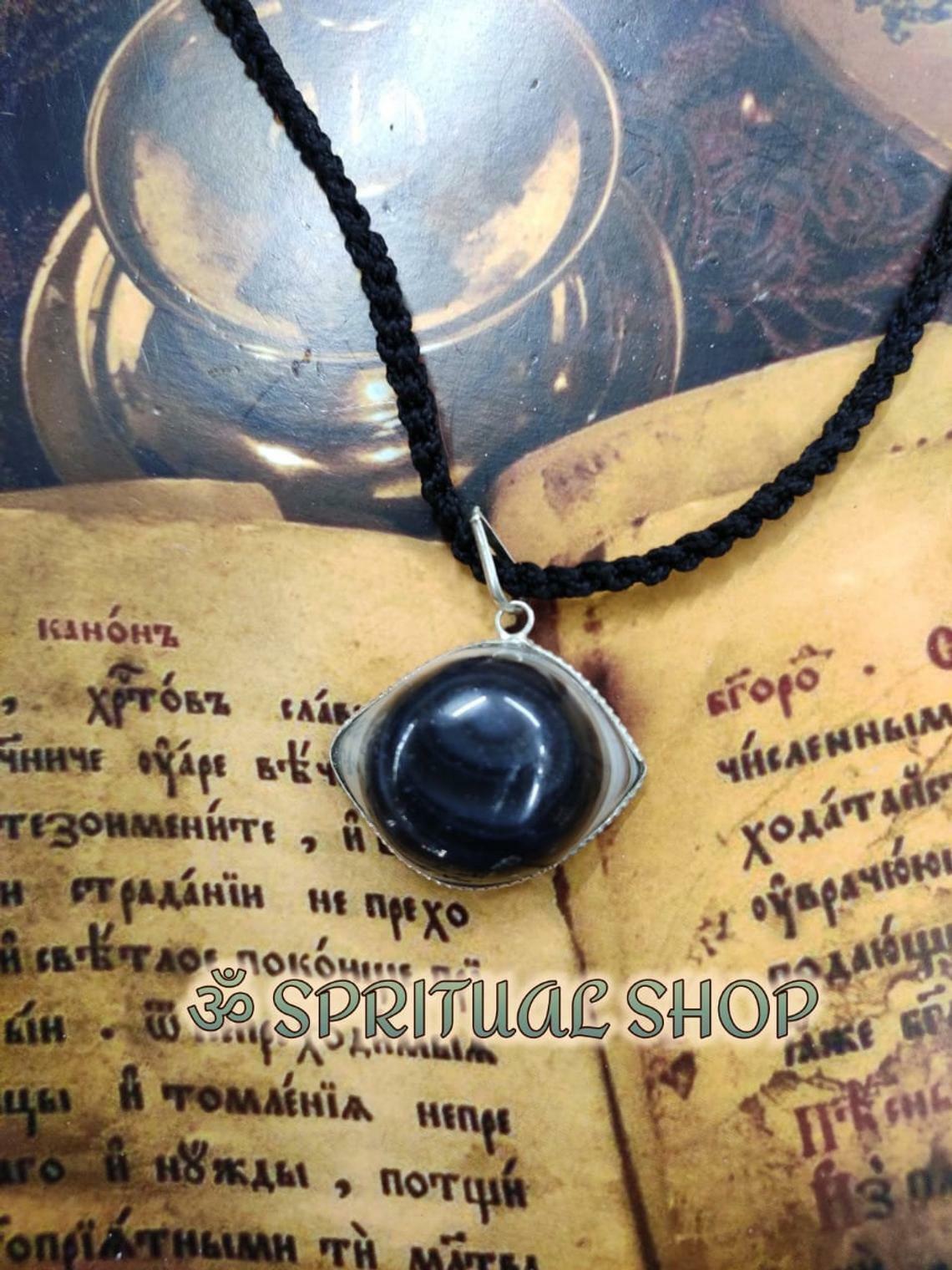 Magickal Eye of RA amulet cloaked n the powers of the Ancient Gods