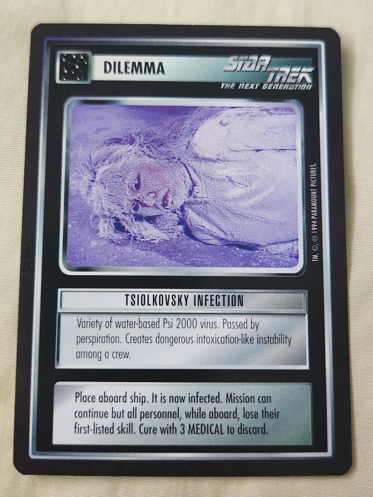 Star Trek CCG TSIOLKOVSKY INFECTION BB Premiere Limited Never Played