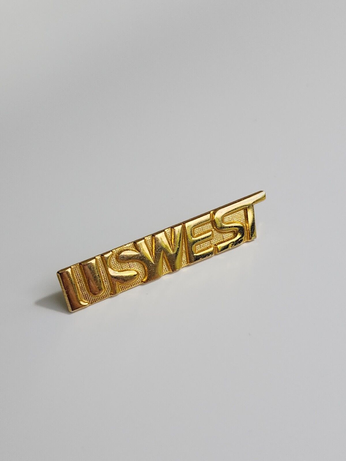 US West Lapel Pin Gold Color Defunct Telecommunications Company RARE