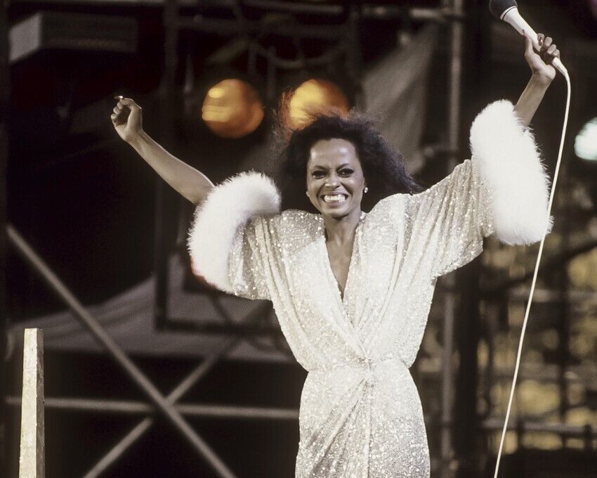 Diana Ross in white sequined dress triumphant arms in air in concert 8x10  Photo