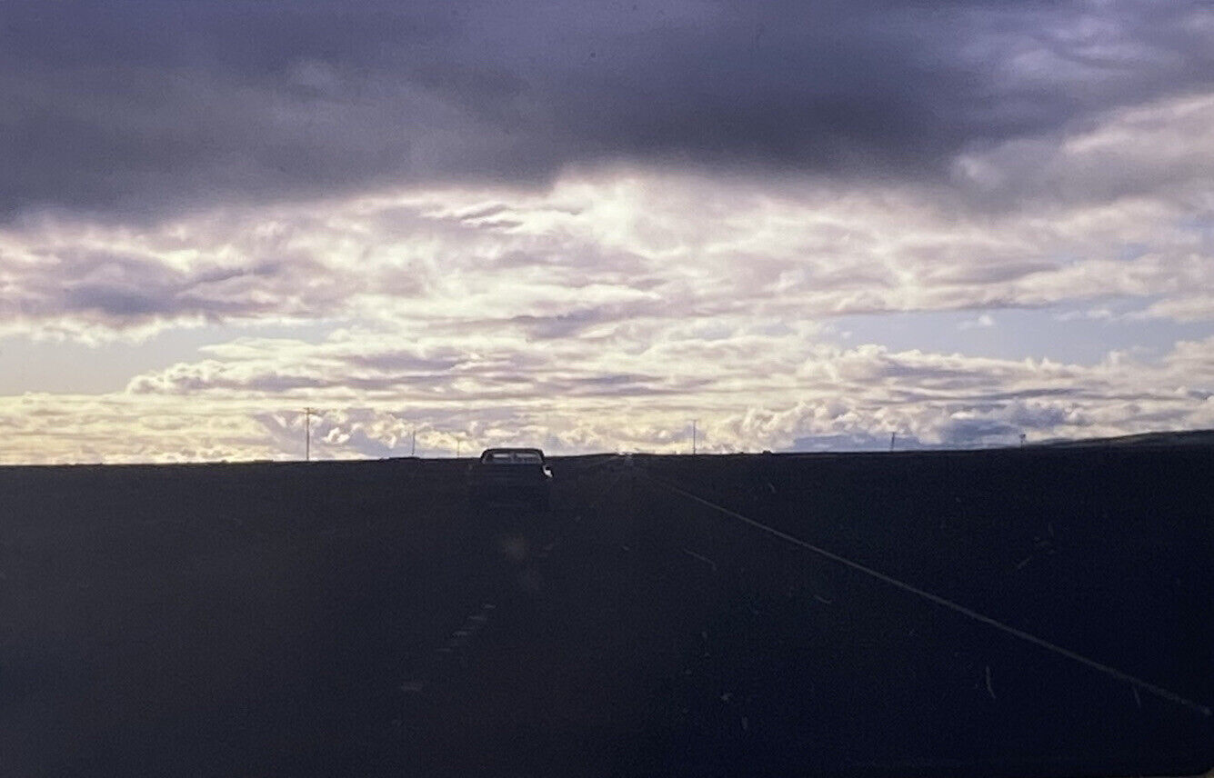 Vintage Photo Slide 1982 Car Driving Down Cloud Sky Road