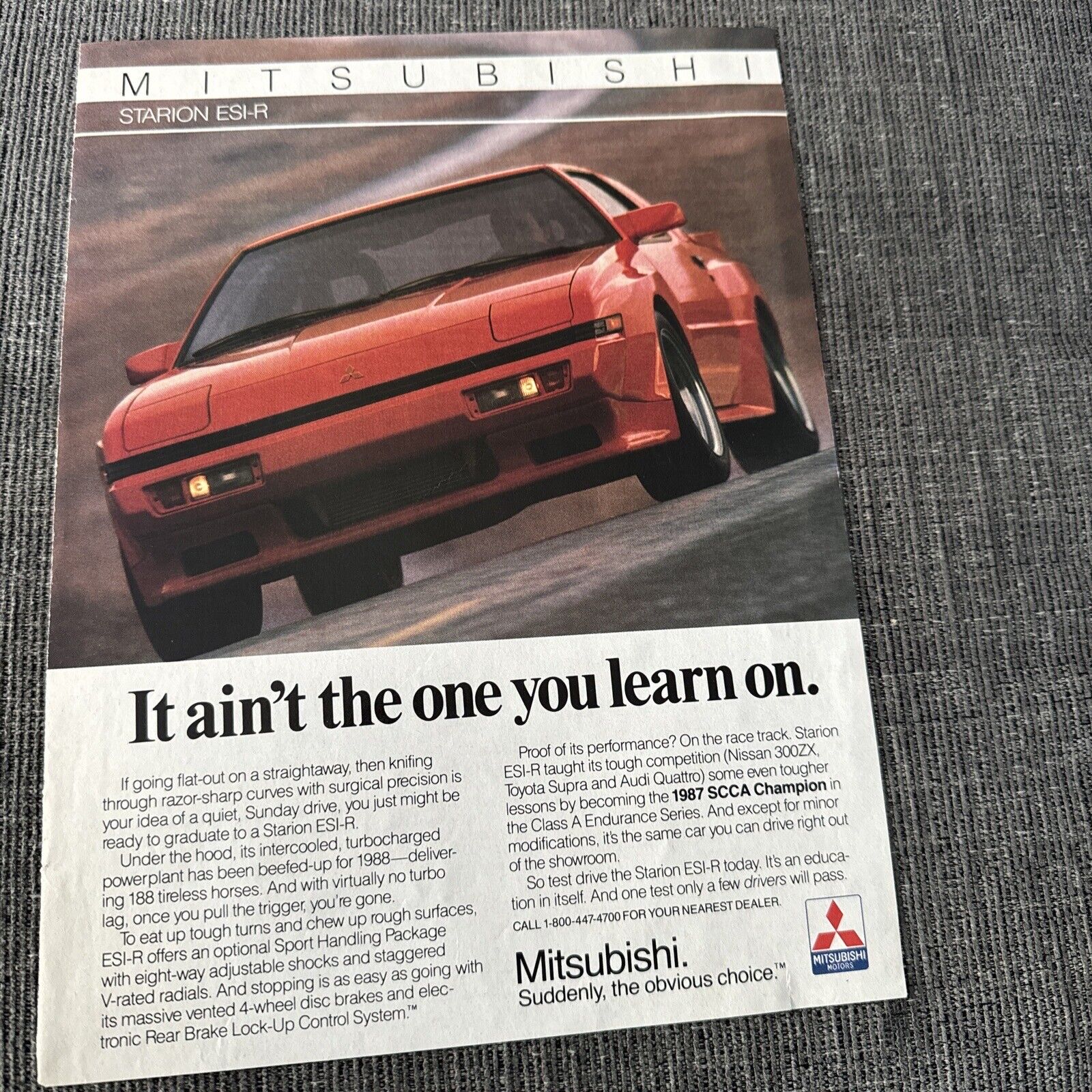 1988 Mitsubishi Starion ESI-R Red Coupe Advertisement
