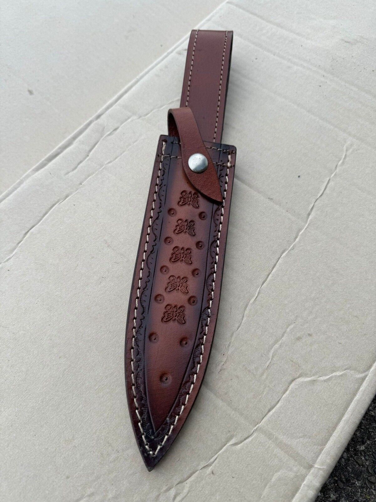 Handmade Premium Leather Sheath, 14 inch overall. Holds 9 inch blades.