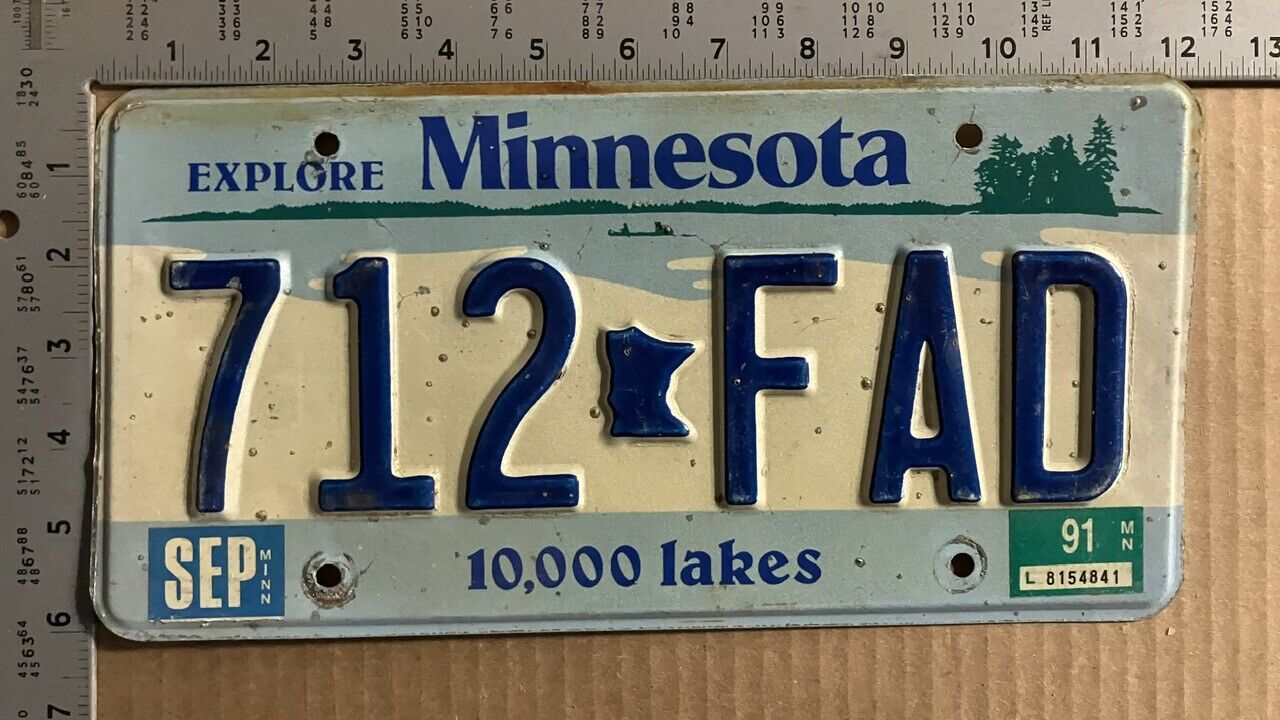 1991 Minnesota license plate 712-FAD Ford Chevy Dodge 14370