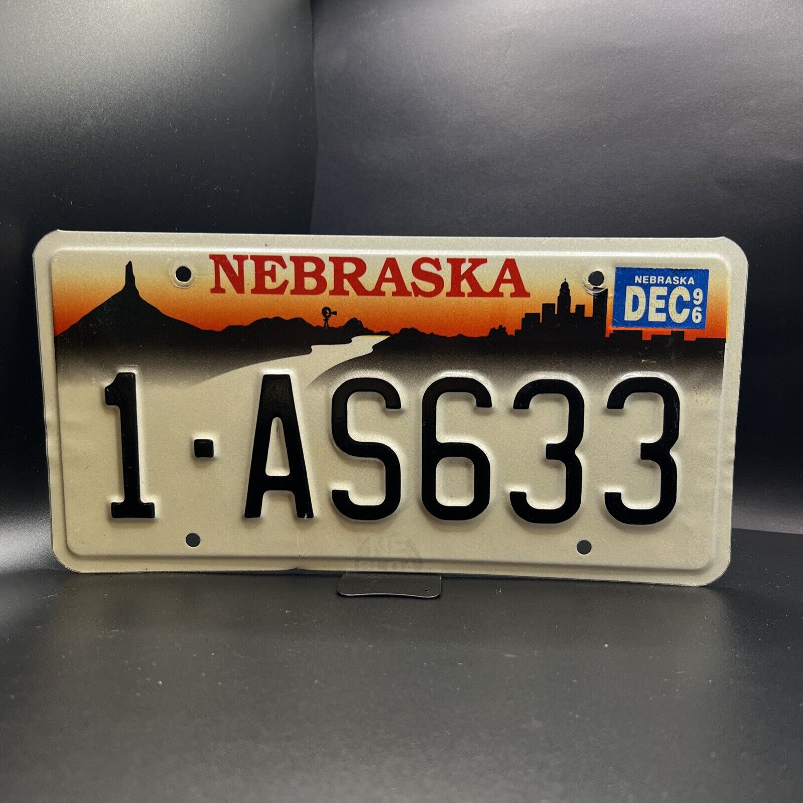 1996 Nebraska License Plate 1-AS633 Omaha Skyline