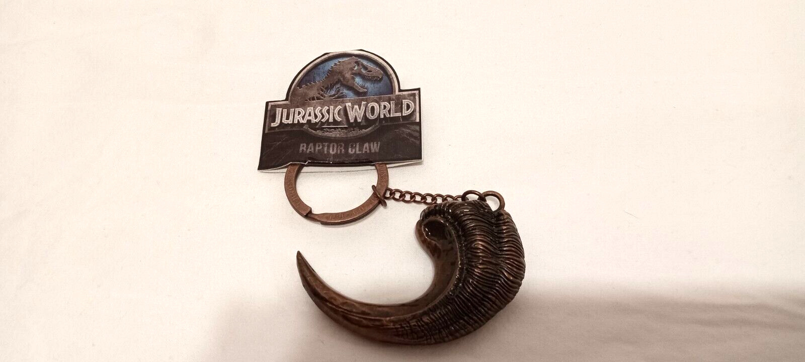 Loot Crate Jurassic World Bronzed Metal Raptor Claw Keychain