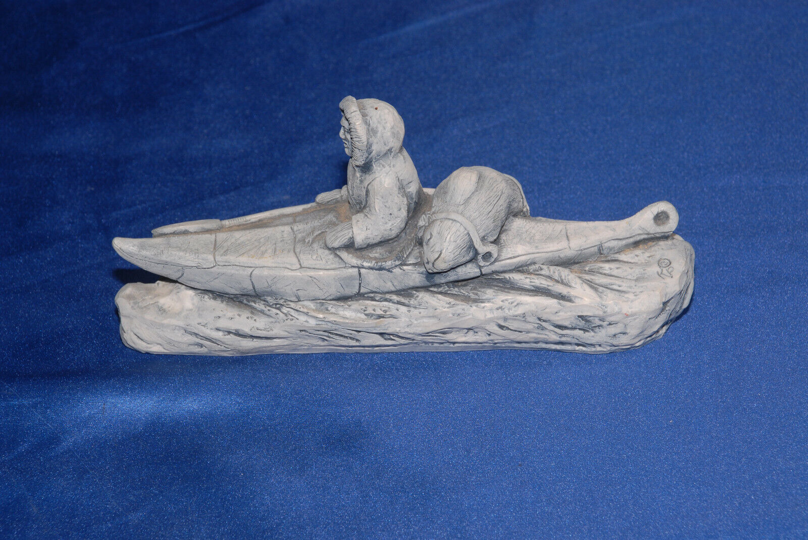 VINTAGE Glacial Ice Age Sculpture  Alaska ESKIMO IN Kayak with HUNT by A.C.E