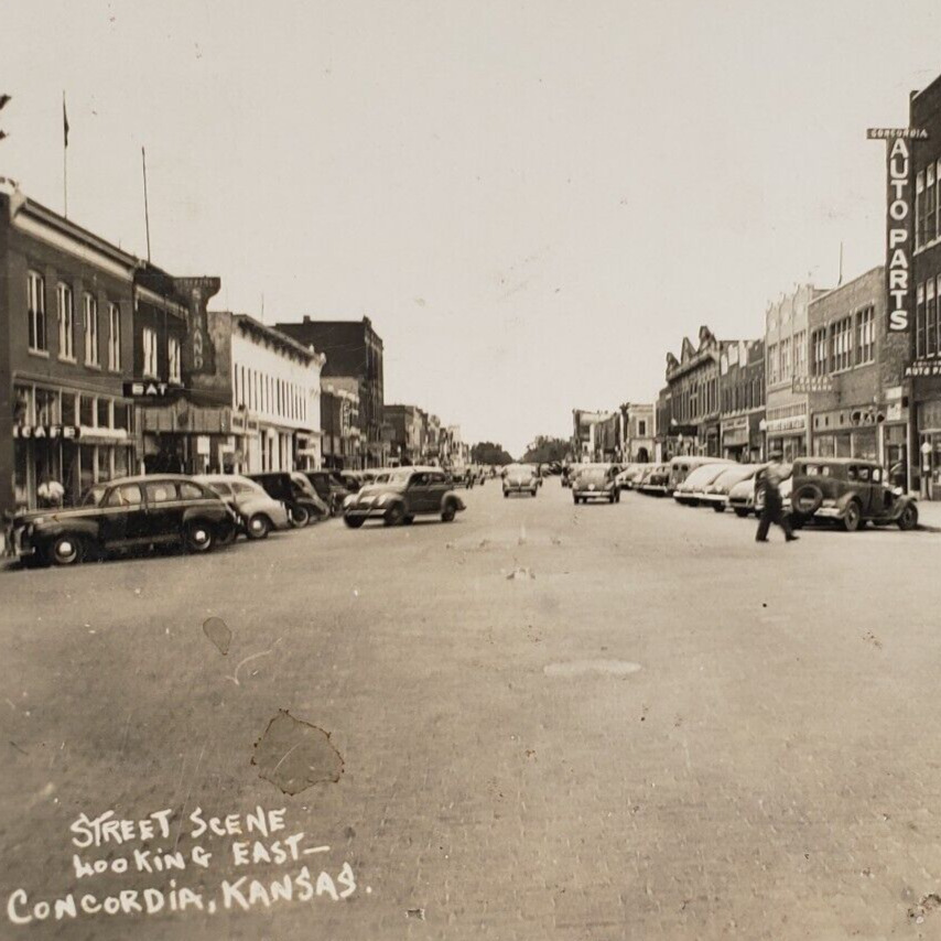 Concordia Kansas Main Street RPPC Postcard 1940s Ford Automobile Mercury KS K614