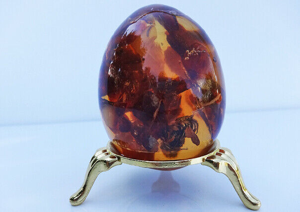 Egg - a souvenir with Baltic amber  INSECTS inside With Stand