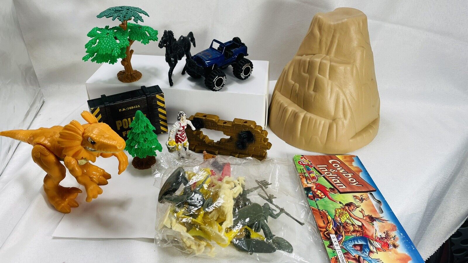 Junk Drawer Lot of Cowboys And Indians, Dinosaur, Trees, Jeep And More Toys