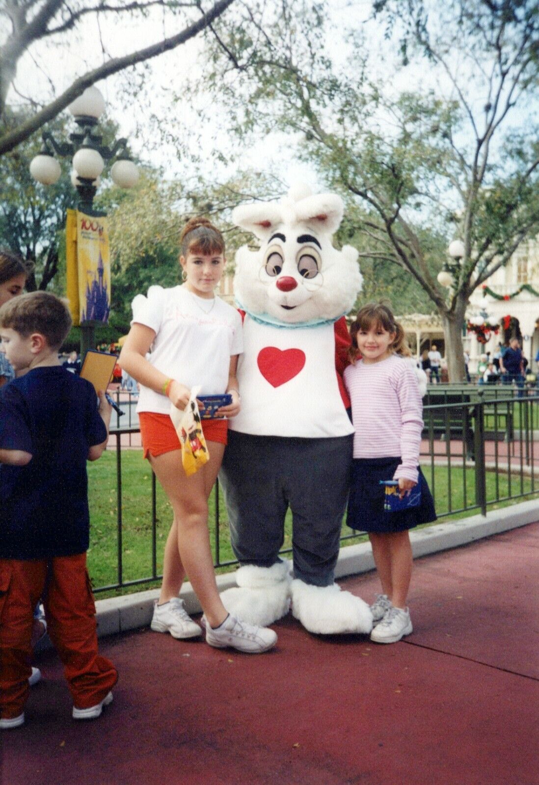 2000\'s Found Photo - Young Girls Pose White Rabbit At Disney World Theme Park