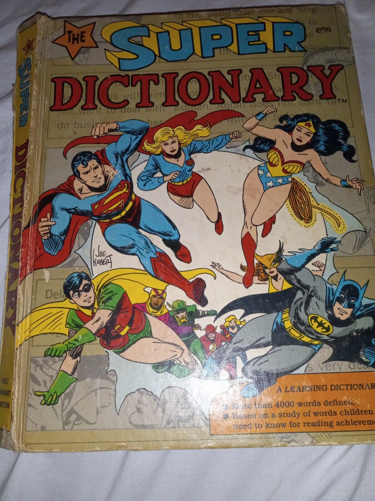 The super dictionary . Superman batman robin wonderwomen 