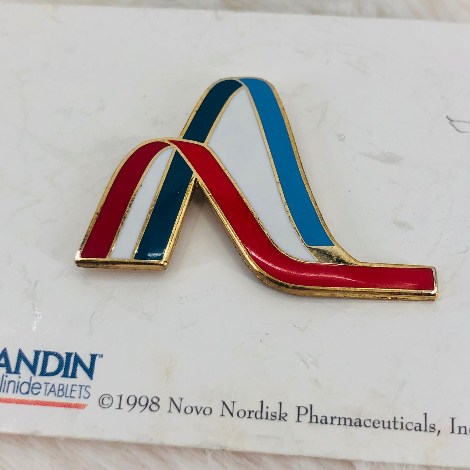 1998 Novo Nordisk Pharmaceuticals Prandin Repaglinide Drug Advertising Lapel Pin