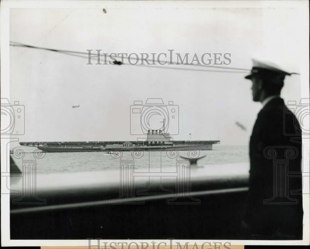 1942 Press Photo An officer views the USS Wolverine in the distance, Chicago IL