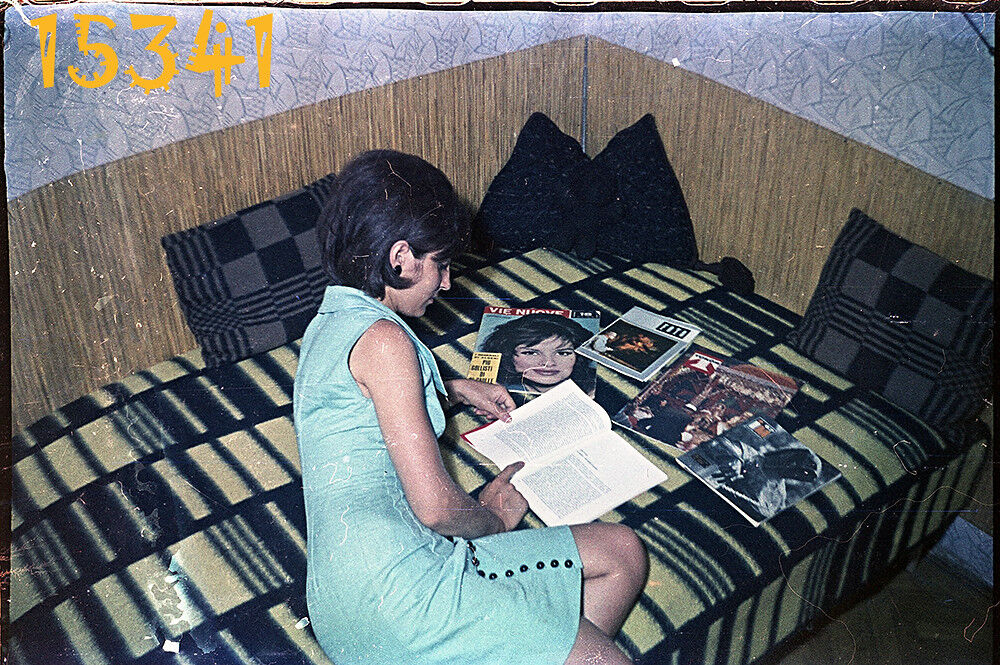 vintage negative sexy girl in mini clothes reading, VIE NUOVE magazine 1960’s H