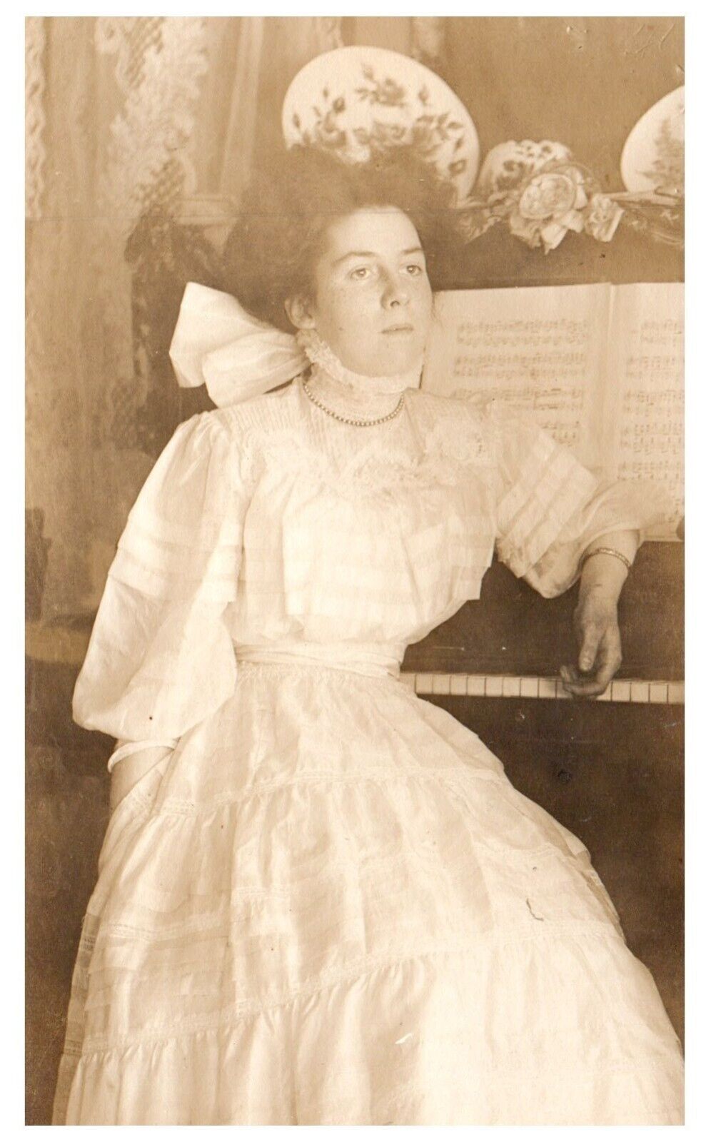 RPPC Beautiful Woman Filthy Dirty Hands White Dress Piano Postcard c. 1910