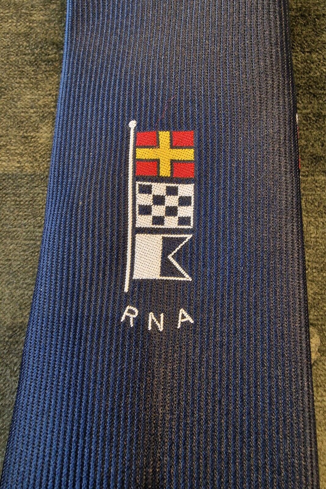 A British Royal Naval Association RNA Polyester Necktie. 