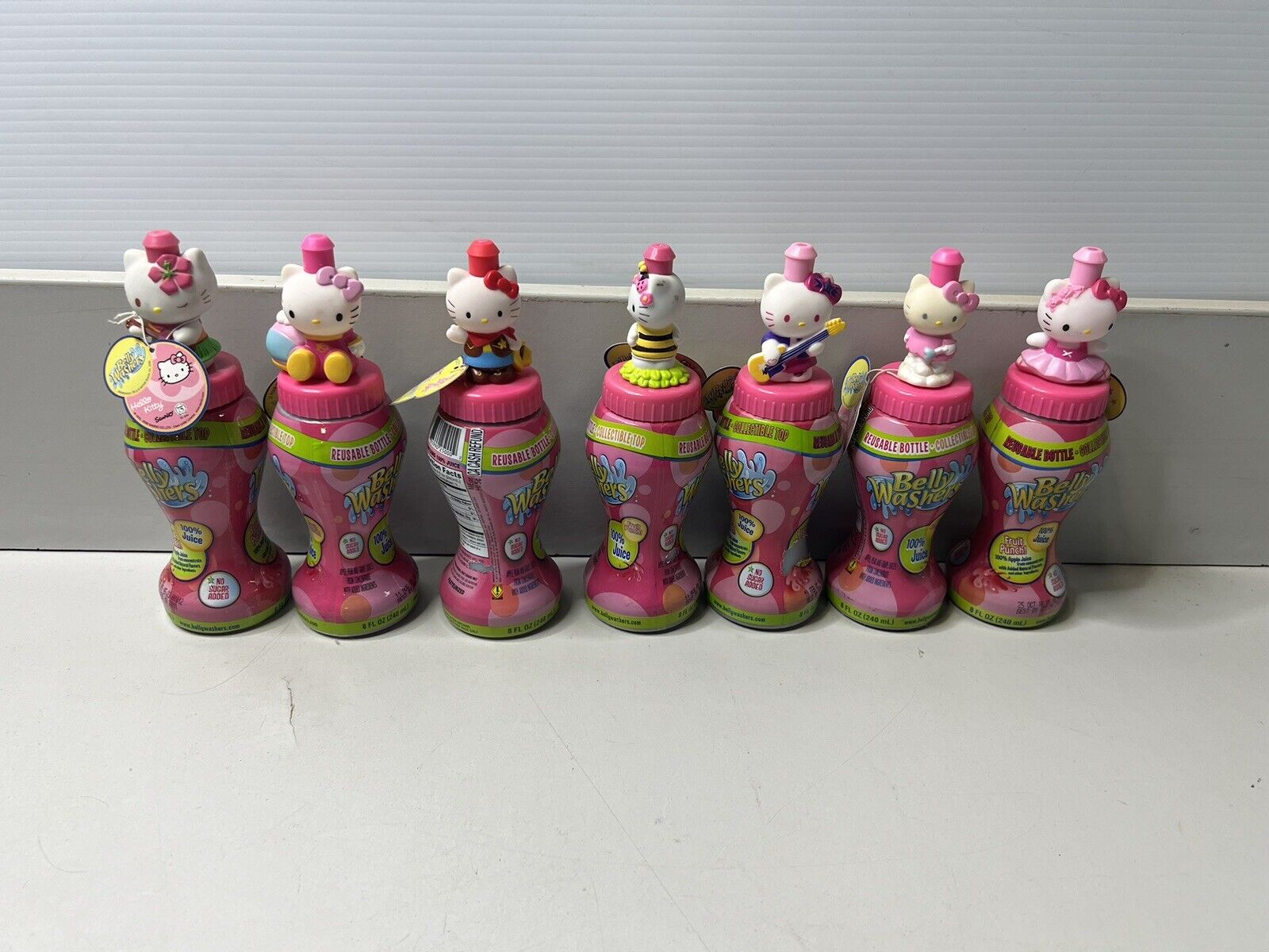 Hello Kitty Belly Washers Lot of 7 NOS