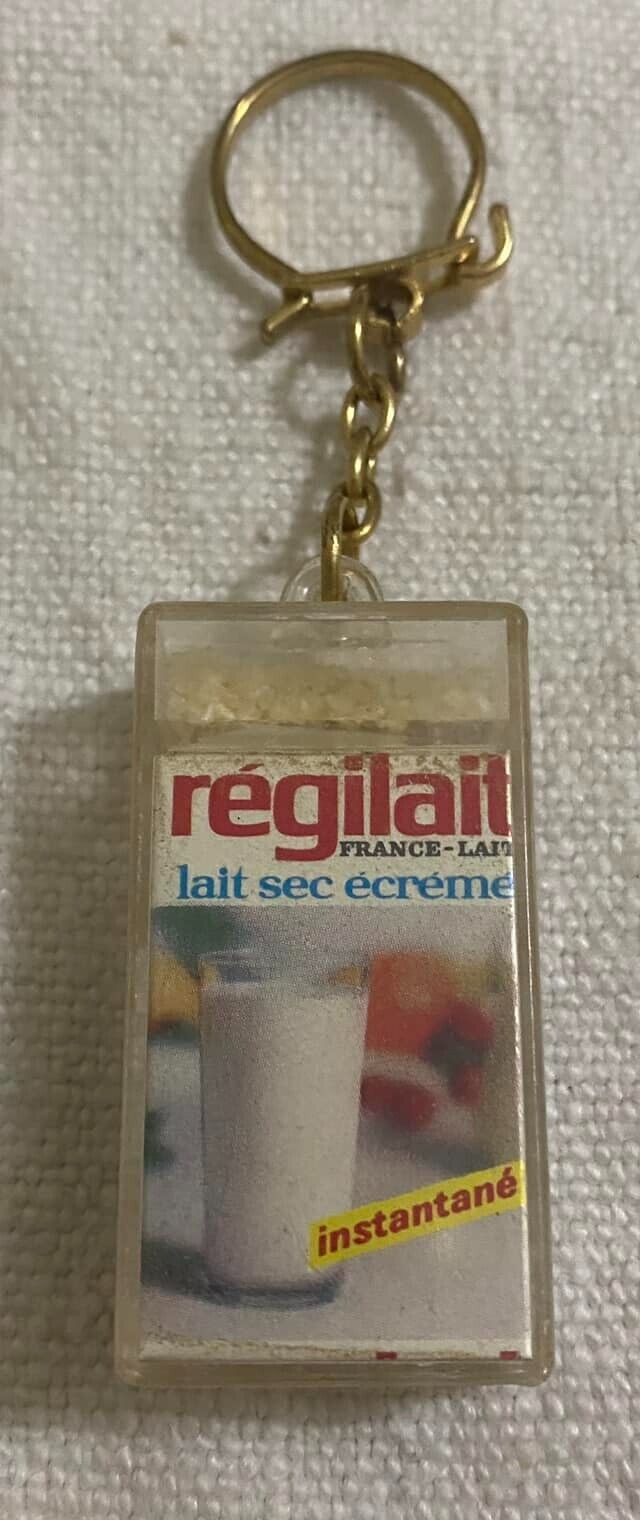 Vintage advertising keychain Régilait milk drink old collection pack 60s France