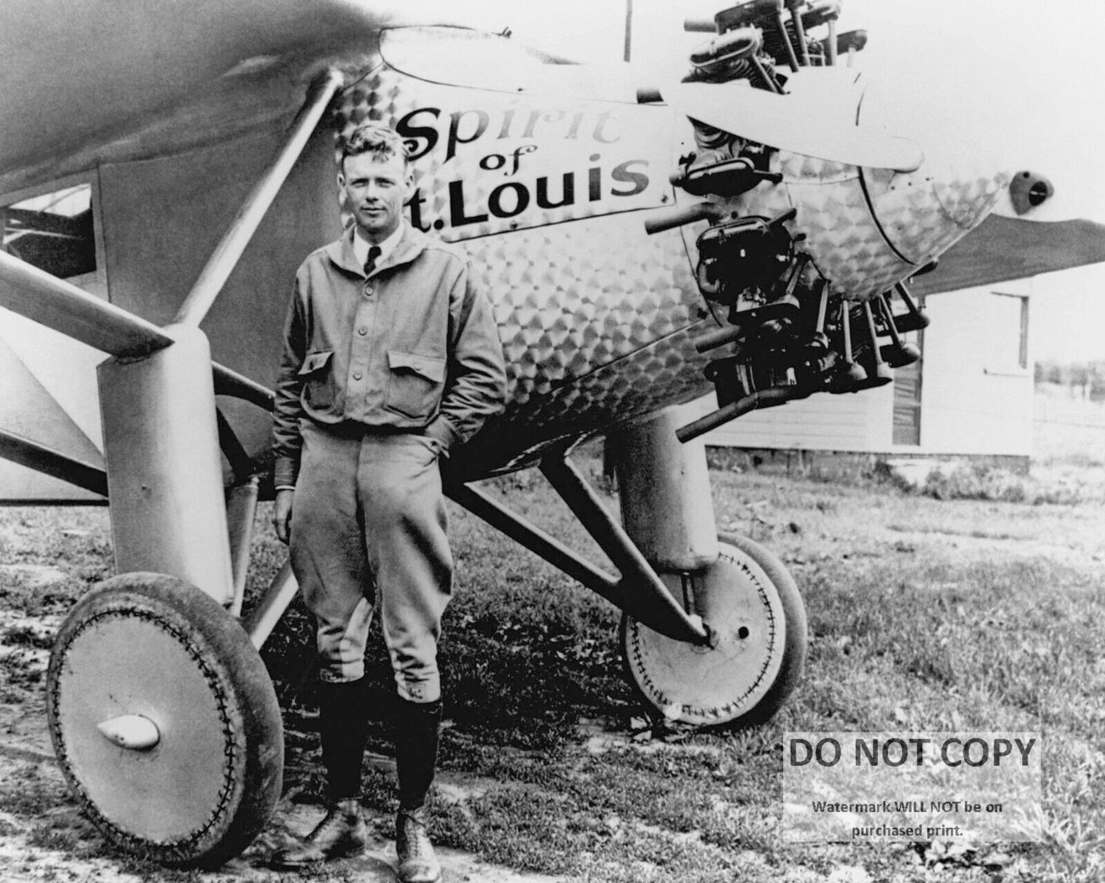 CHARLES LINDBERGH IN FRONT OF PLANE \