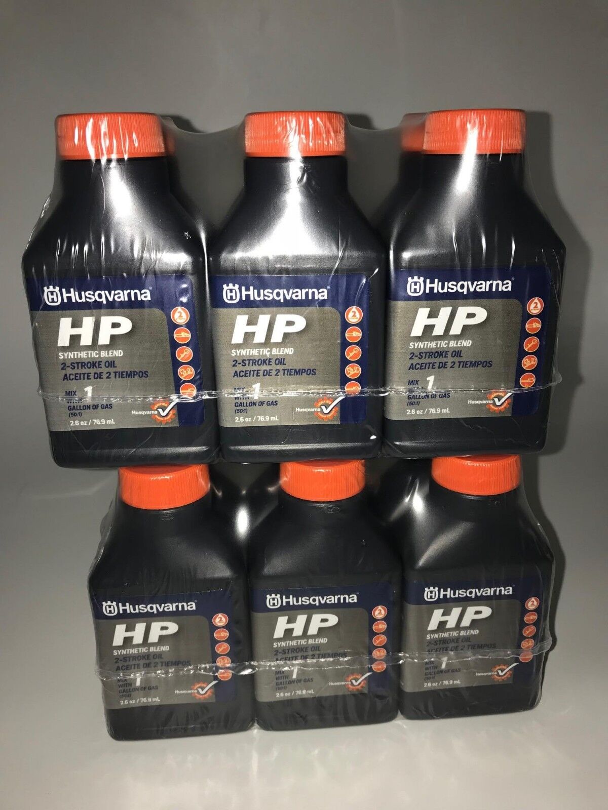 Husqvarna 2 Stroke HP Oil w/ Fuel Stabilizer 50:1 1 Gal Mix 12pk 2.6oz Bottles