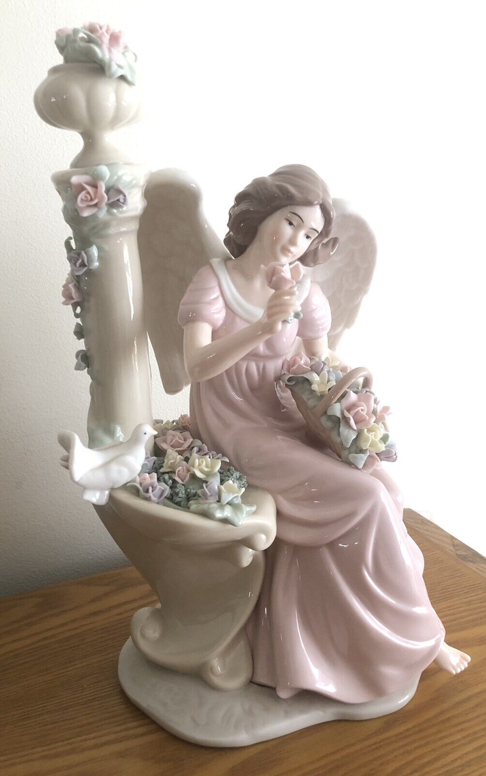 Member\'s Mark Painted Porcelain Angel Sitting with Ornate Flowers 13” Tall 7” W