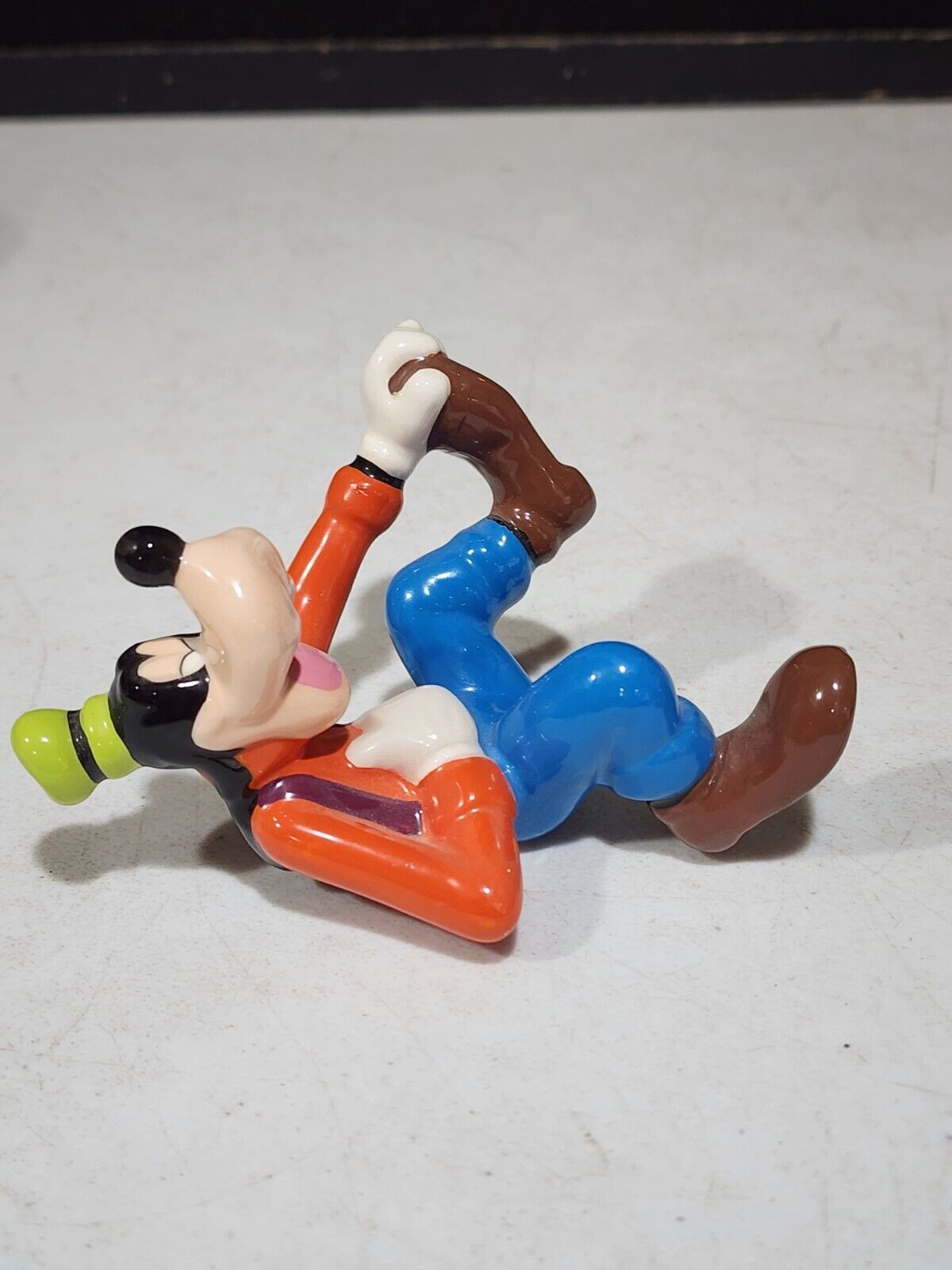 Vintage Disney Ceramic Goofy Figurine Laughing on Back