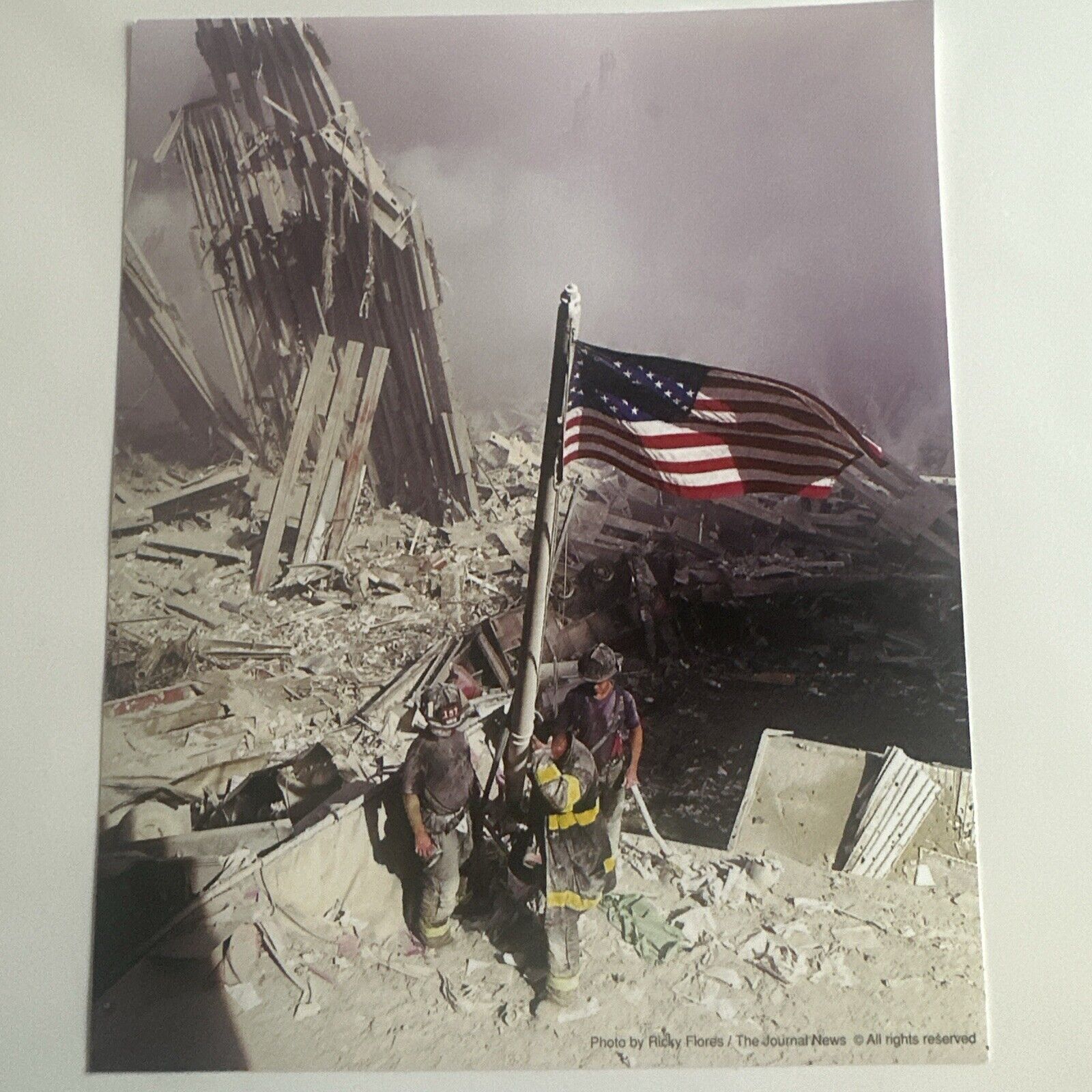 9/11 Photo. Firefighters Raising The Flag