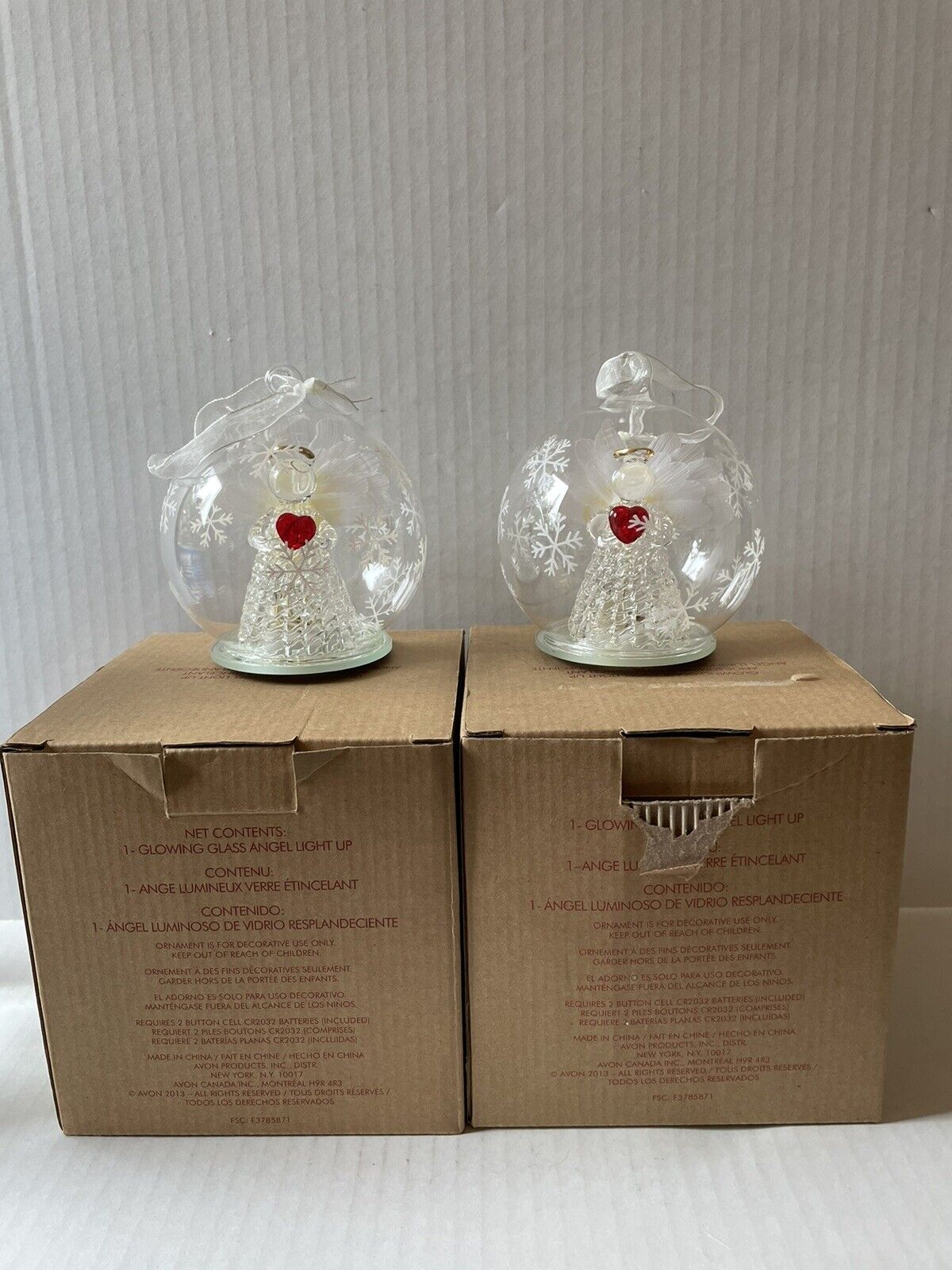 2013 AVON GLASS ANGEL HOLDING HEART LIGHT-UP ORNAMENT With Snowflakes Pair