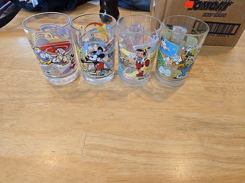 McDonalds 2002 Disney 100 years of Magic Glasses  / Cups - Set of 4. New