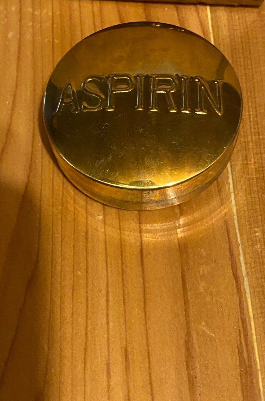 Vintage brass aspirin pill box