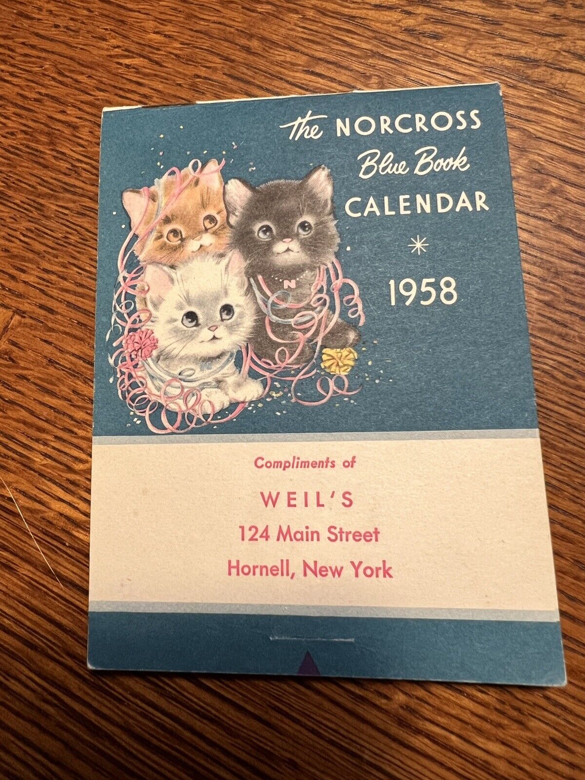  NORCROSS Blue Book Calendar Easel Style 1958 Compliments of Weil\'s Hornell NY