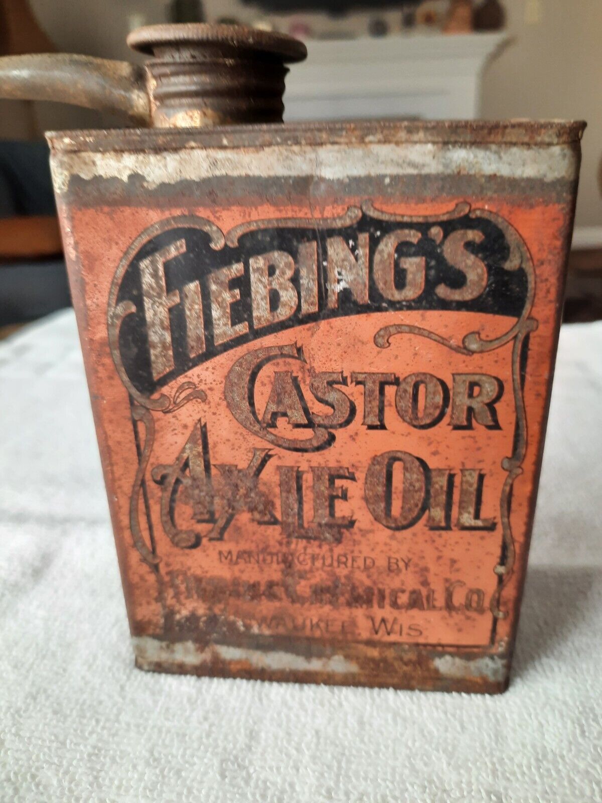 Antique FIEBING'S CASTOR AXLE OIL TIN hand stenciled label with original cap