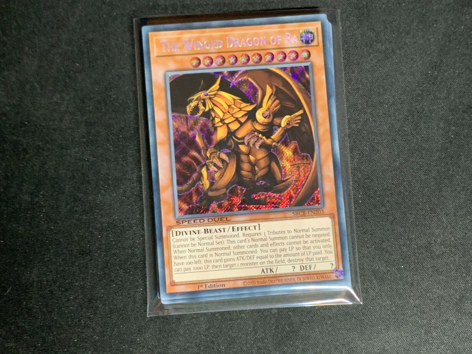 SBCB-EN203 The Winged Dragon of Ra Secret Rare 1st Edition Mint YuGiOh Card