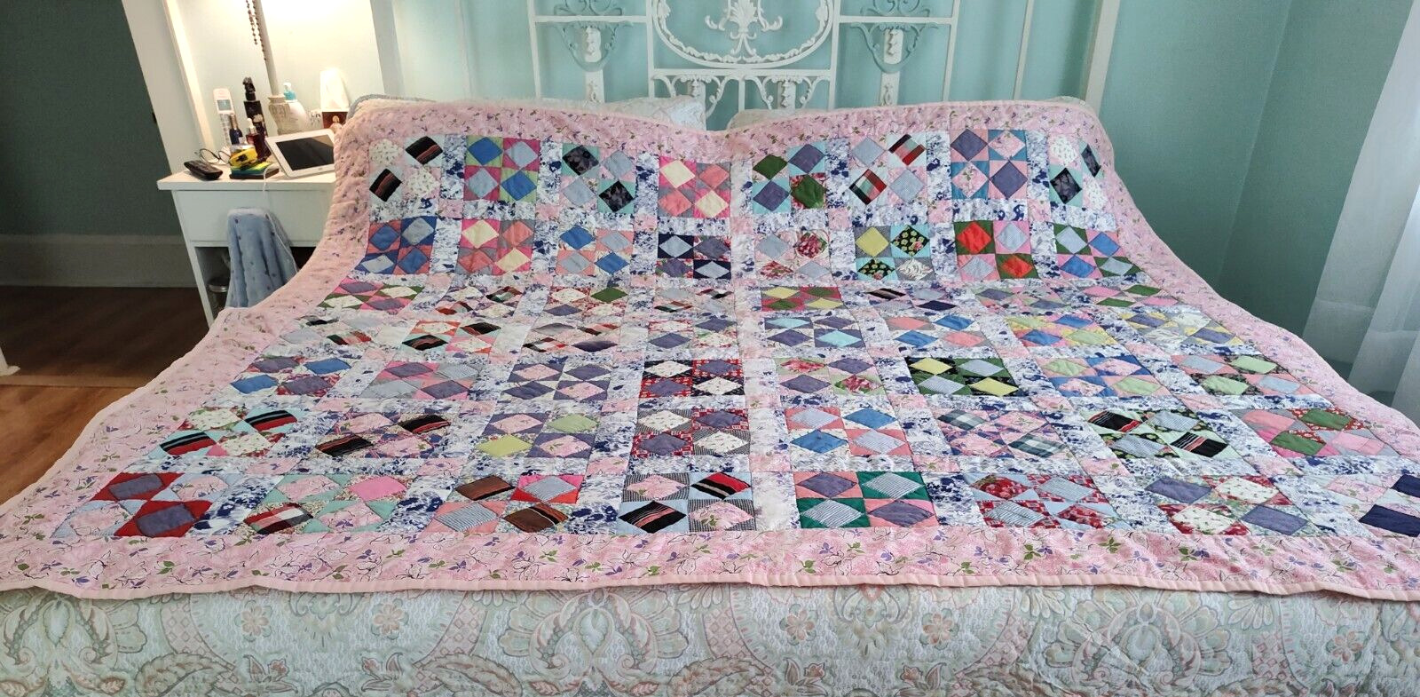 Beautiful, classic four patch quilt, made from pastel colores solid pink68” X 80