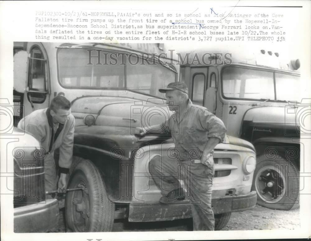 1961 Press Photo Dick Entinger & George Ferrari Repair School Bus Tires in PA