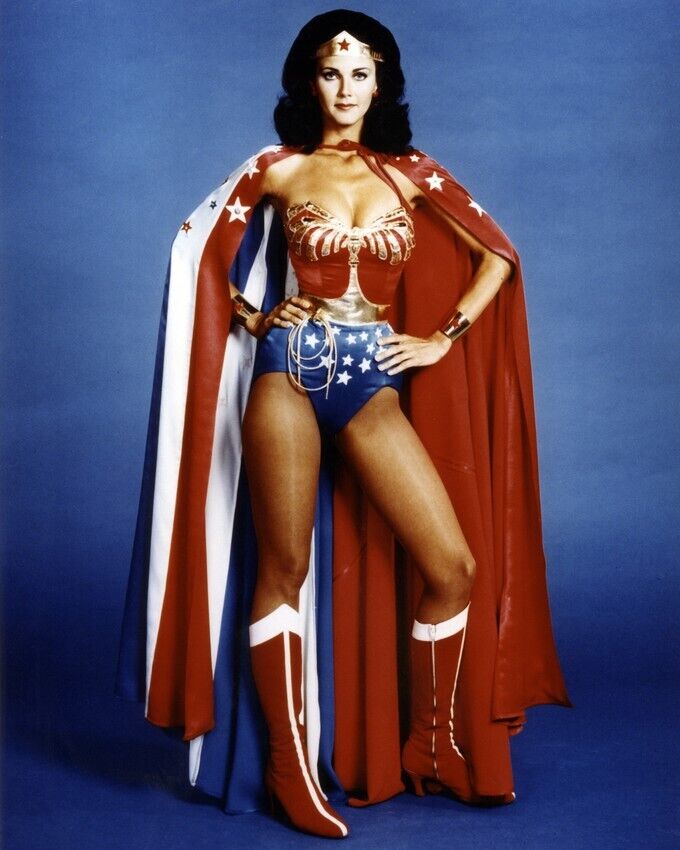 Lynda Carter Wonder Woman in outfit and cape hands on hips 24x36 inch Poster