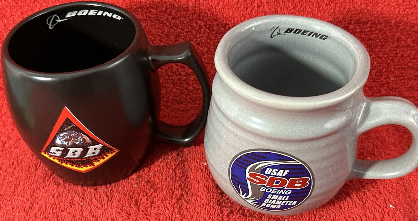 Rare 2 different Boeing Defense Coffee Cup Mug SDB Small Diameter Bomb USAF