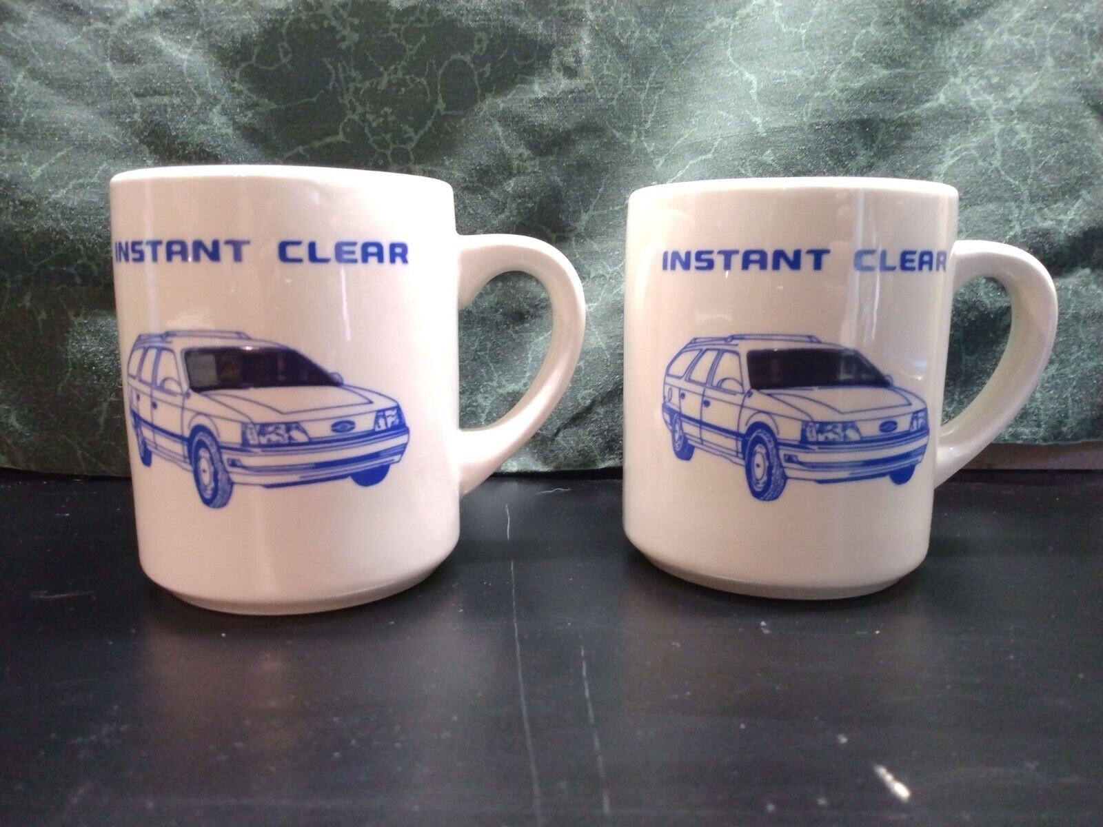 Pair of vintage Ford instant clear coffee mugs