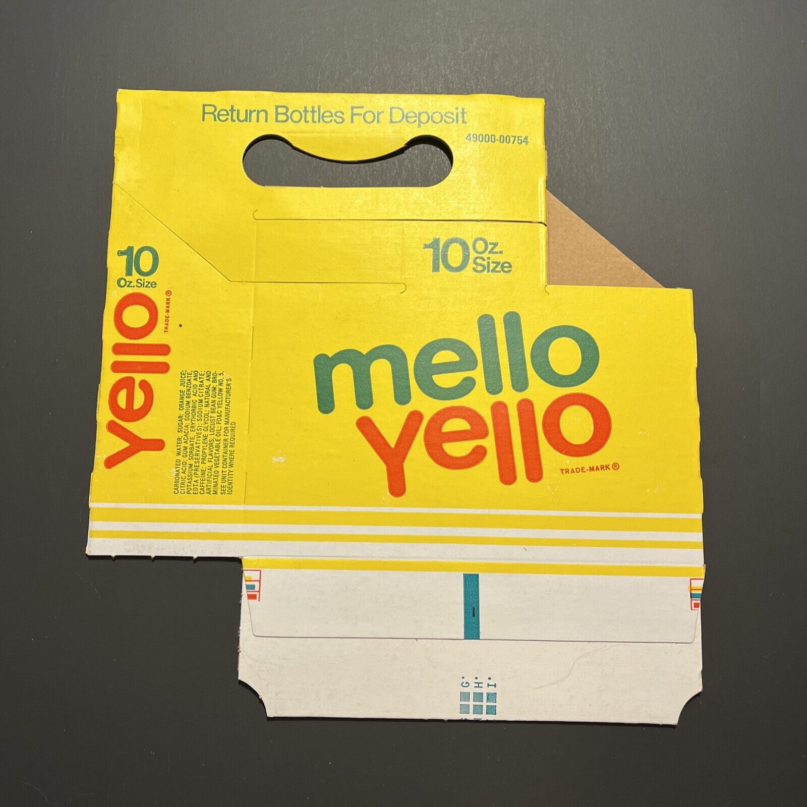 VINTAGE MELLO YELLO 6 PACK CARDBOARD CARRIER FOR BOTTLES - NEW NOS