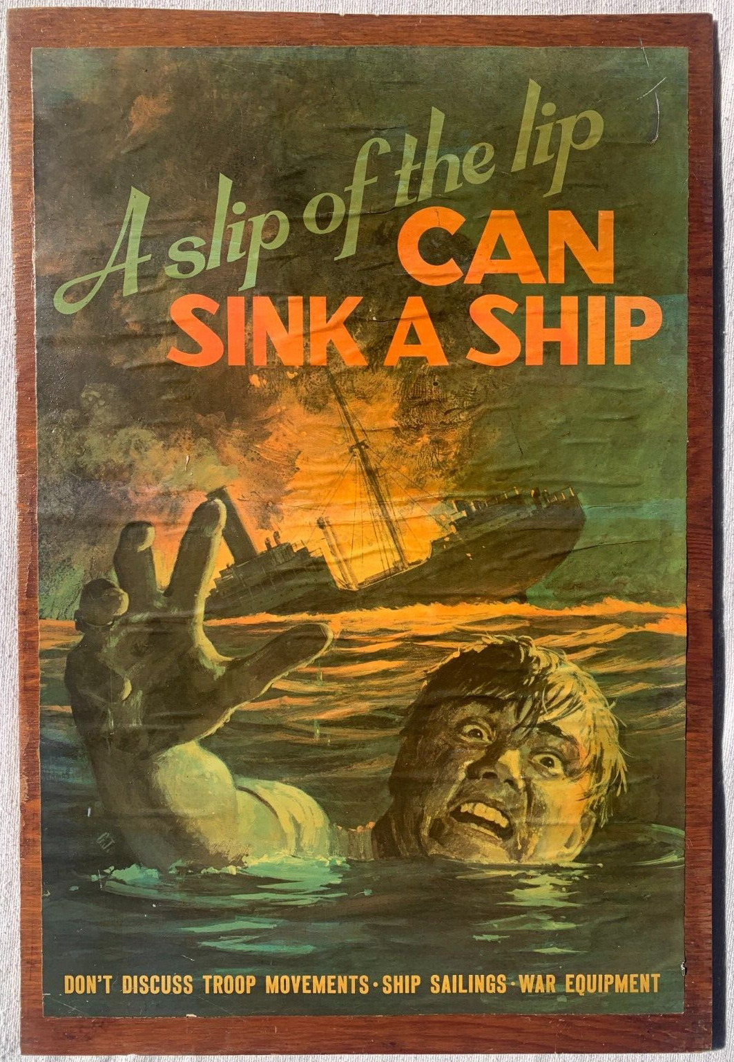 A slip of the lip CAN SINK A SHIP DON\'T DISCUSS TROOP MOVEMENTS poster on board