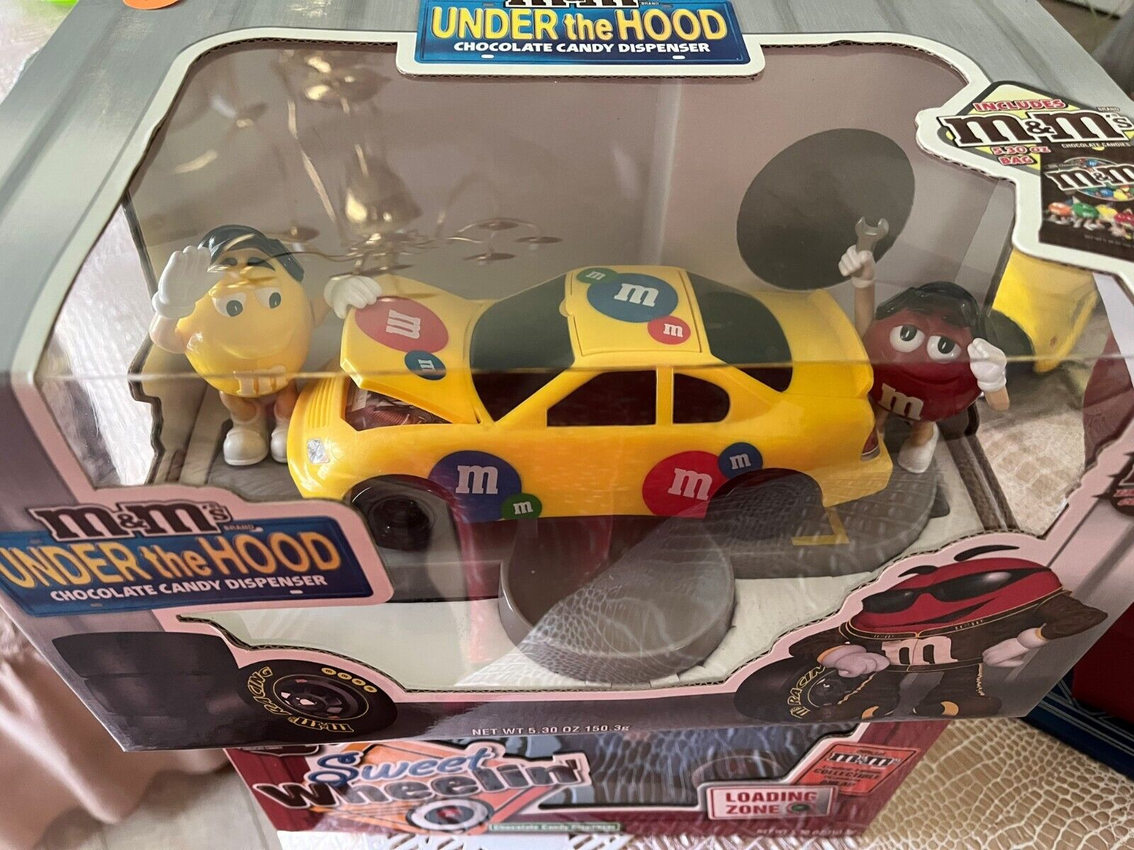 M&M UNDER THE HOOD RACE CAR CANDY DISPENCER YELLOW ( missing candy )