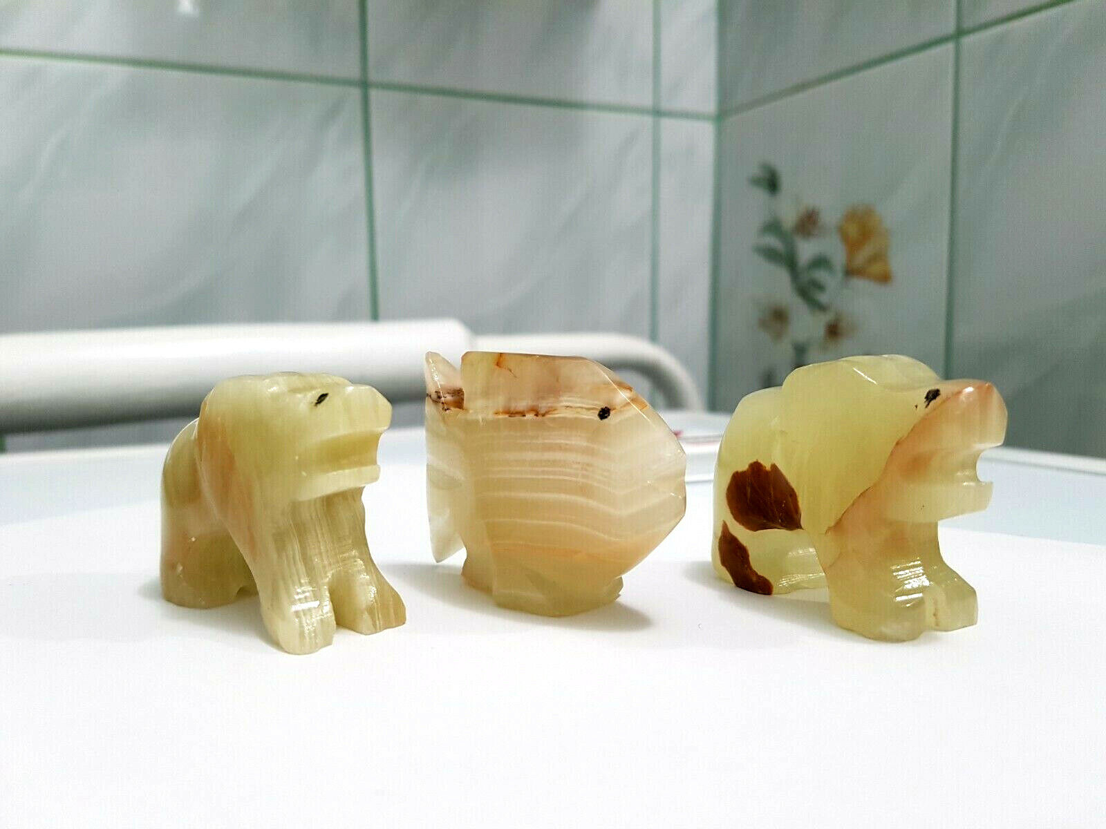 Lot of Three Small Vintage Figures from Natural Onyx. Two Lions and a Fish.