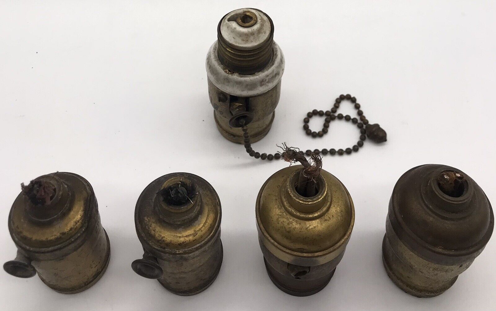 5 VINTAGE HUBBELL BRASS AND PORCELAIN LIGHT SOCKETS/PULL CHAIN.