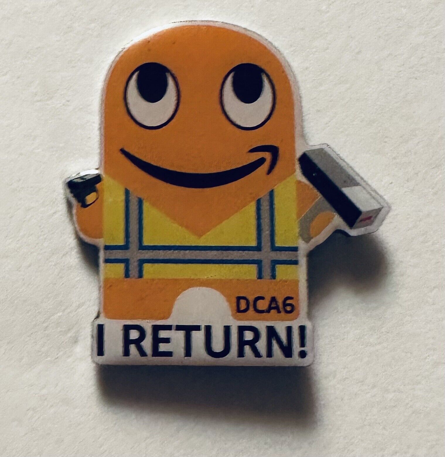 Amazon Peccy “I Return” DCA1 Pin