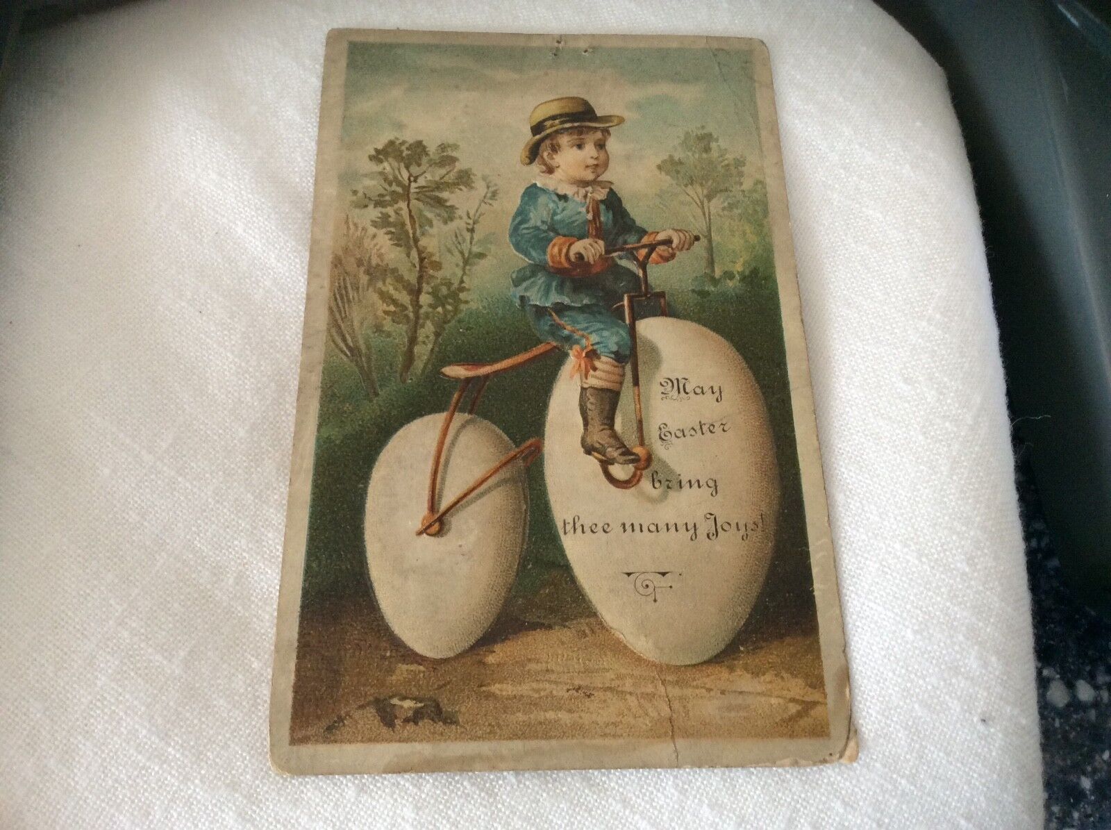 Victorian easter card eggs bicycle EARLY DESIGN INITIALS ONLY pressed molded 